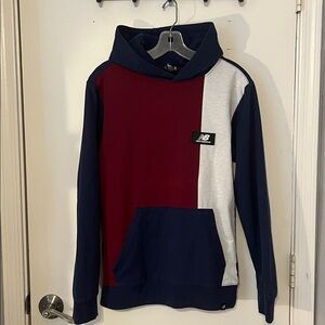 New balance, color block hoodie size 18/20 with Kangaroo pockets.